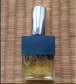 Tuberose Tobacco Cognac by House of Cherry Bomb perfume bottle