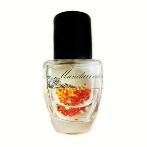 Mandarine Et Herbs by Esquisse Parfum perfume bottle